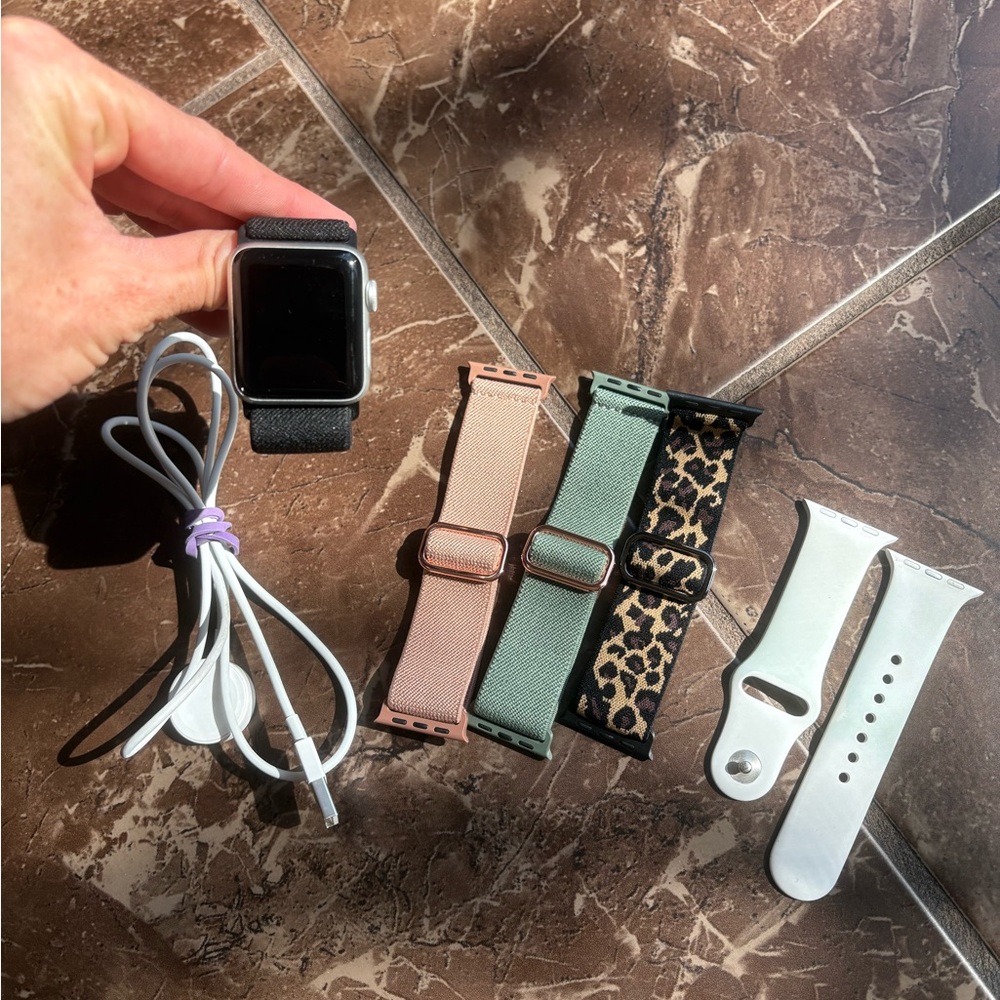Apple Watch Series 3 with 5 bands and charger